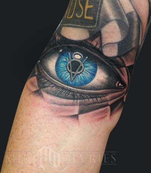 Mike DeVries - Vintage logo eye flag tattoo